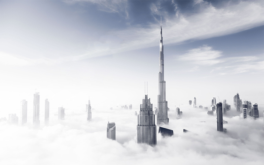 Photoshop给高空建筑物照片调出仙境般的特效场景。