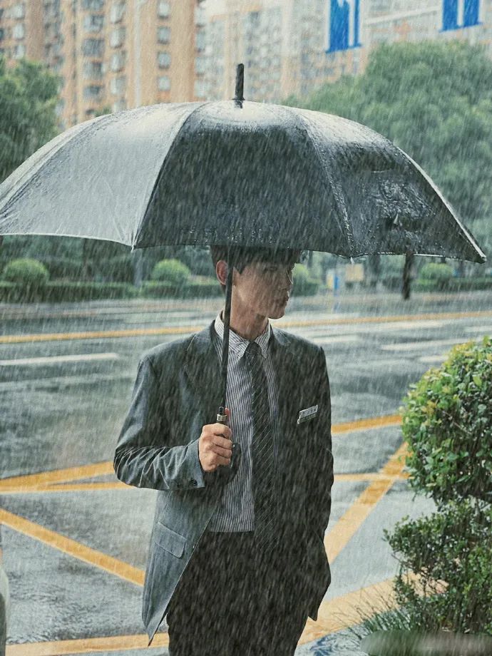 Photoshop给人物照片制作出下雨场景效果，让雨下的更大一些。